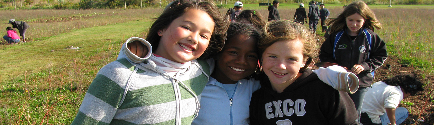 Three young girls on a school field trip